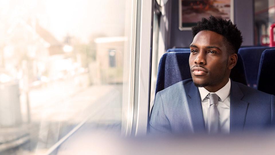 Businessman sitting on a train