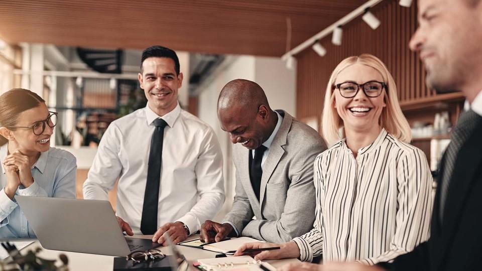 Friendly office workers working together