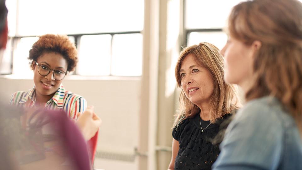 Woman listening to friend intently