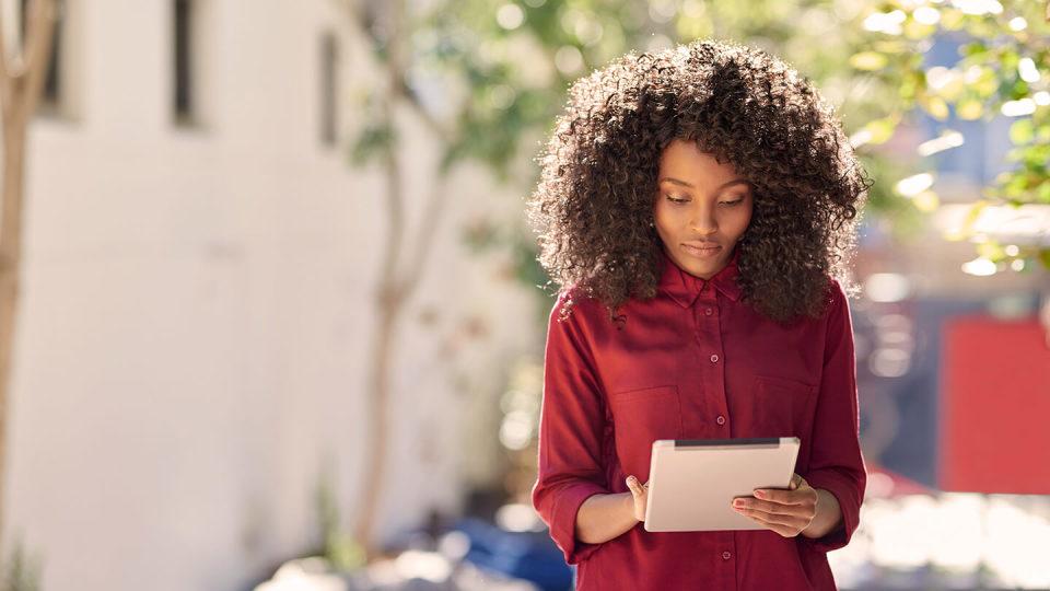 Woman looking down at an Ipad